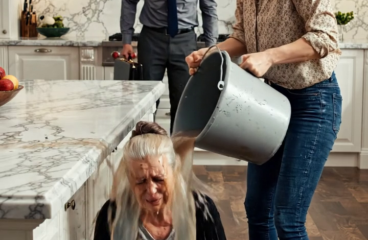 I heard my daughter-in-law call sweetly, “Rest, Mom, I’ll handle everything,” whenever my son was home. But the moment he left, her mask slipped. That evening, as I knelt mopping the floor, she sneered, “You useless old woman!” and dumped a bucket of filthy water over my head. Frozen in the doorway, my son saw it all. In that single moment, the lie shattered—and my life would never be the same again. – True Stories